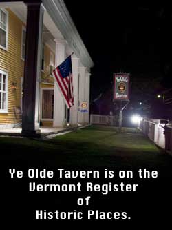 Ye Olde Tavern lit up at night in Manchester, Vermont